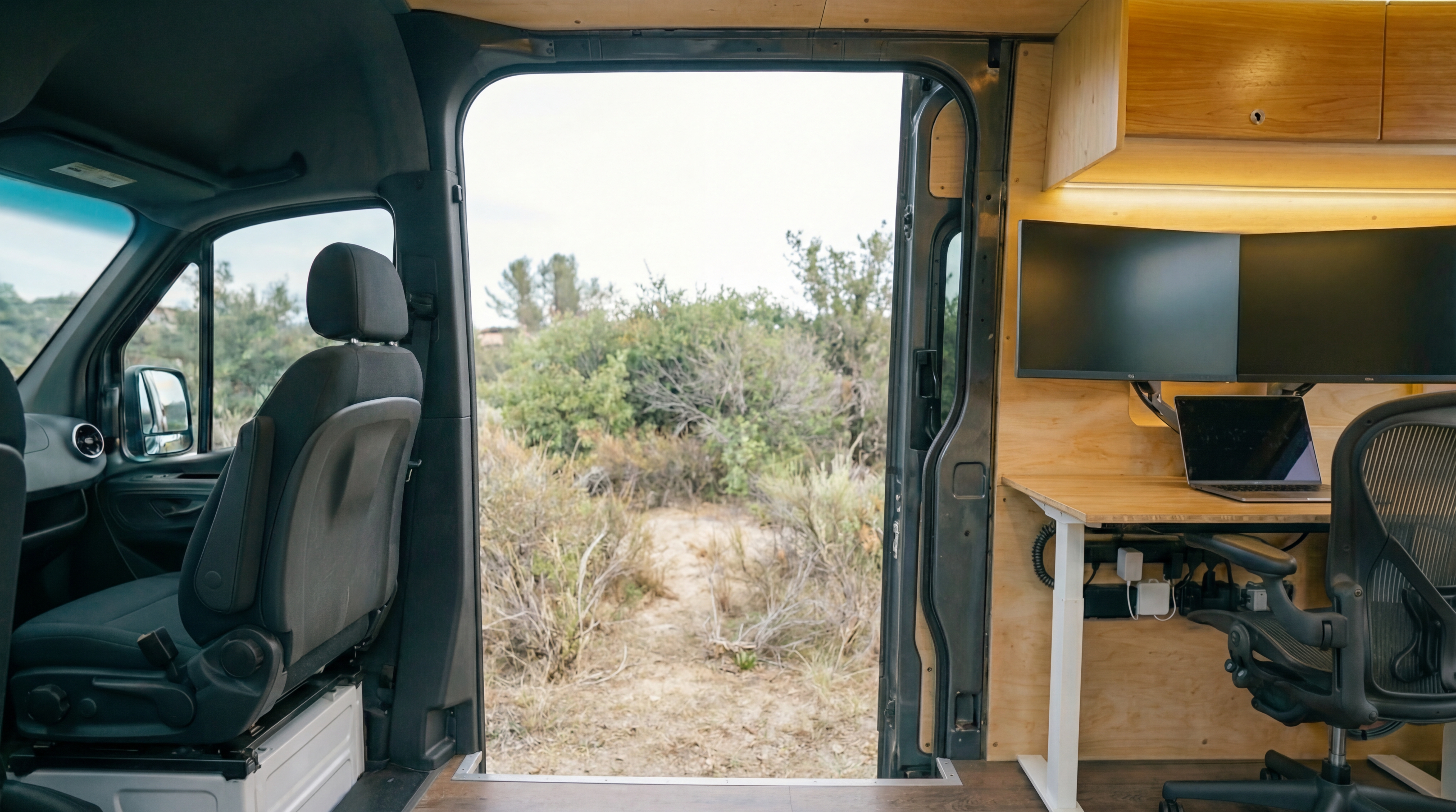 Standing desk workspace inside the Sprinter
