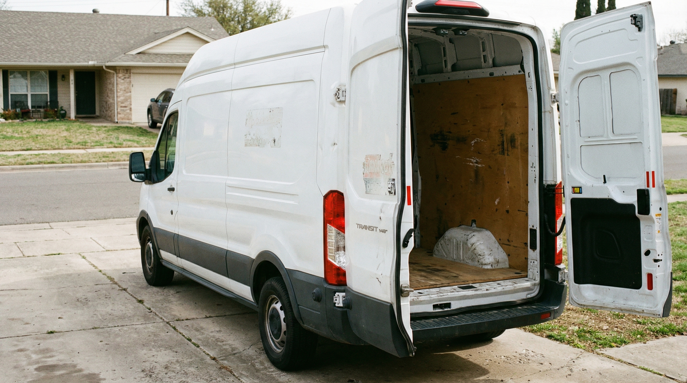 Transit before the build — empty cargo van