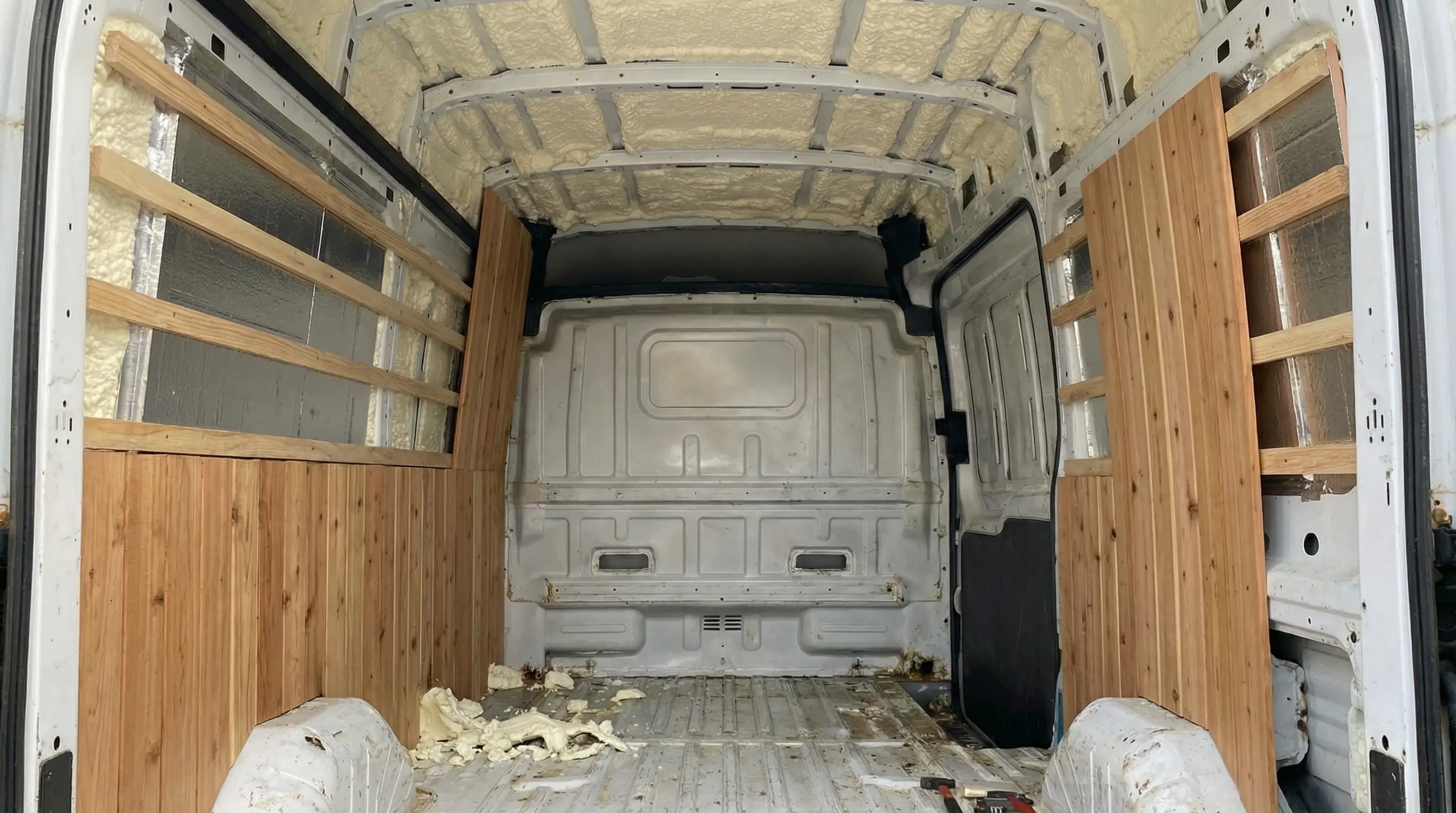 Cedar wall panels going up